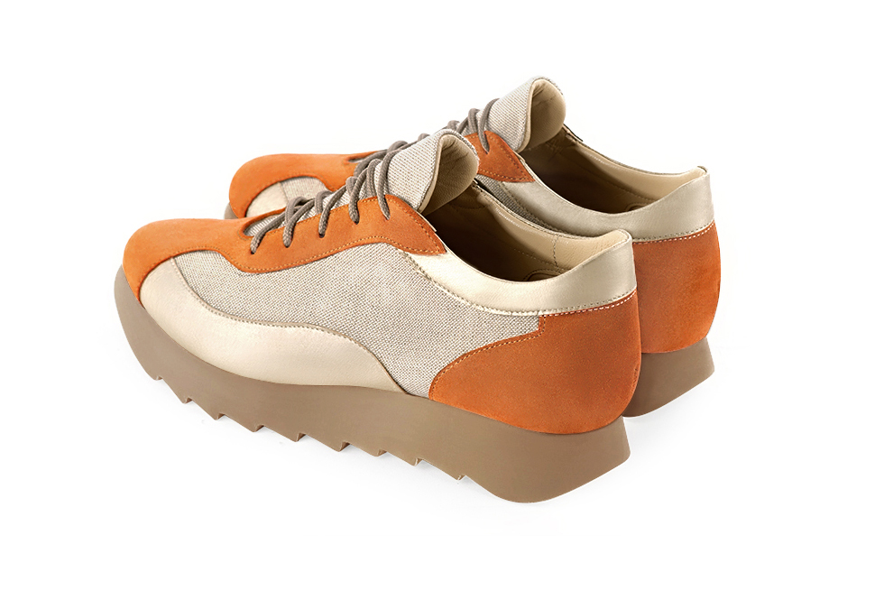 Apricot orange and gold women's two-tone elegant sneakers. Round toe. Low rubber soles. Rear view - Florence KOOIJMAN